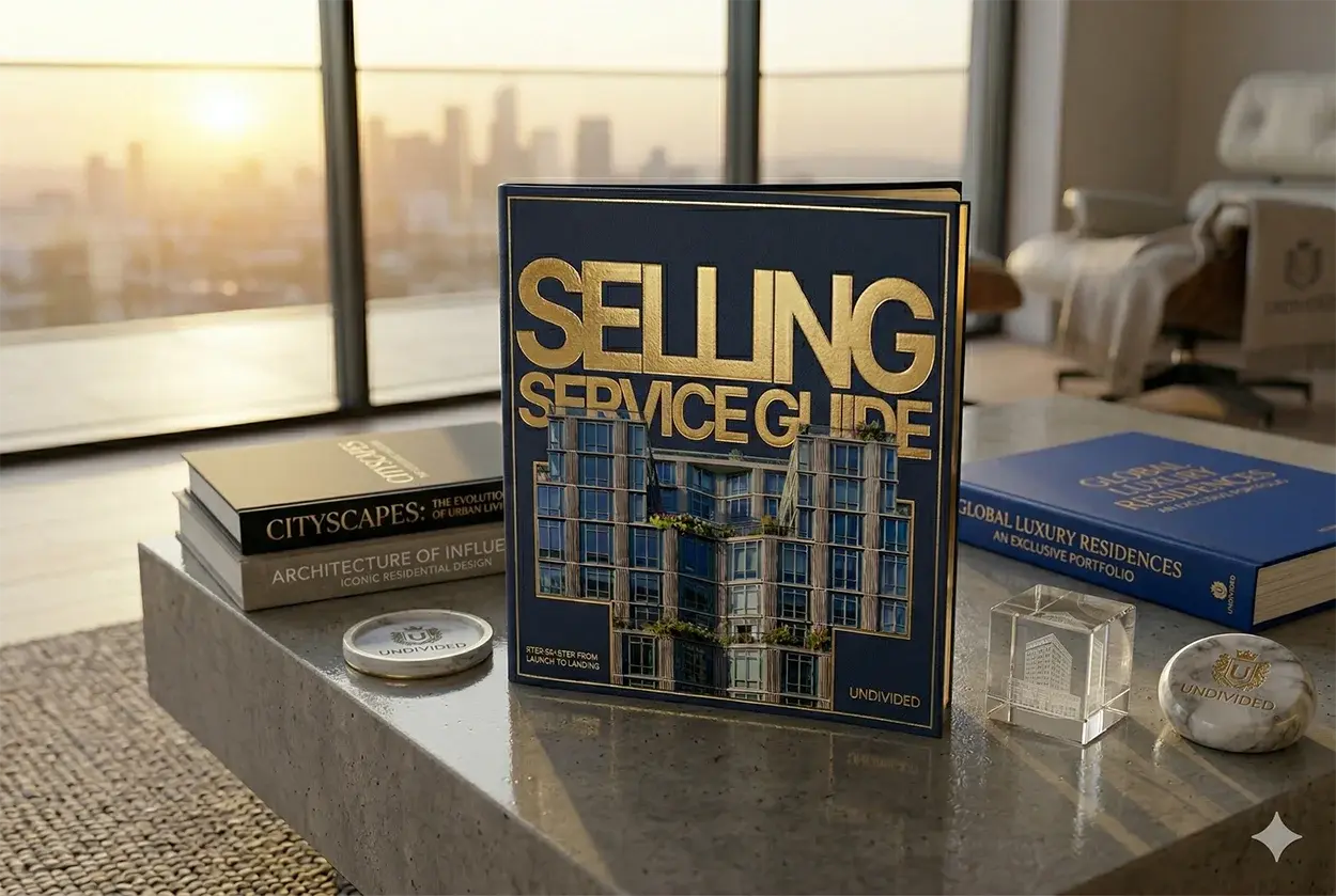 Seller's Guide book sitting on coffee table in modern condo
